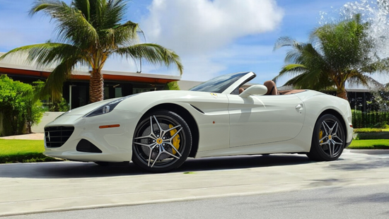 A white Ferrari California T convertible car. Luxury Car Rental Miami
